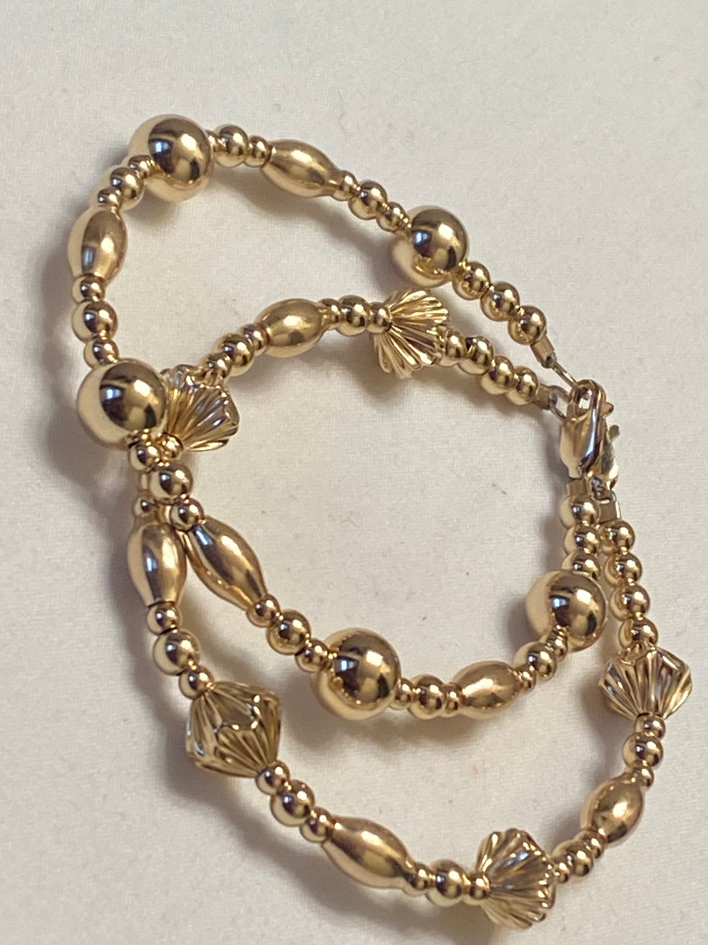 2 Gold Bracelets with fancy Beads (Set)